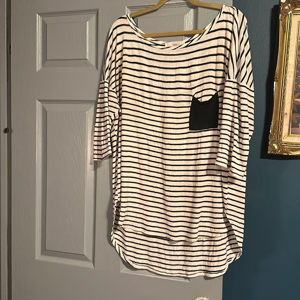 Black and white striped over sized long sleeved shirt.